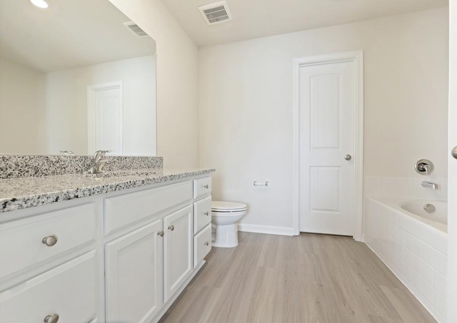 Master bathroom with a walk-in shower.