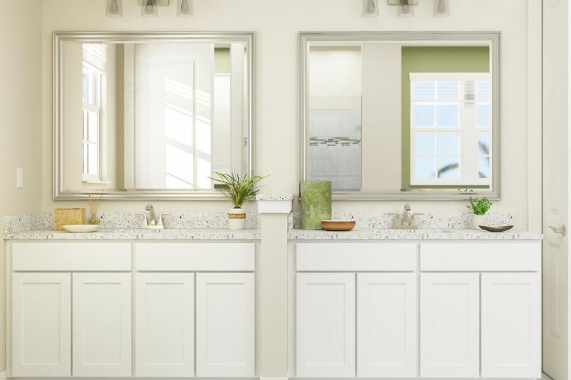 Rendering of spacious master bath showing
  a double sink vanity with white cabinetry and light fixtures and a view of
  the master bedroom on the right.