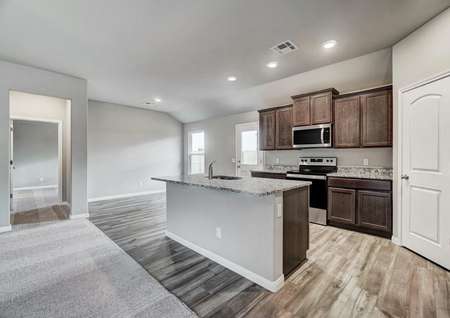 Chef-ready kitchen featuring all new stainless steel appliances and tall, spacious cabinets.