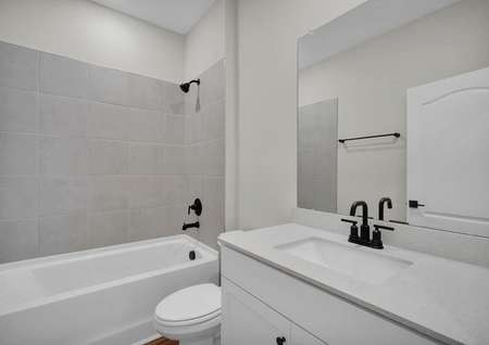 Great countertop space is found in the guest bathroom in the Halifax home.