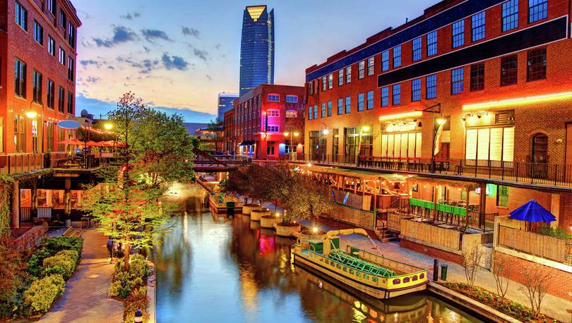 Bricktown Canal in Oklahoma City, Oklahoma shown in the evening.