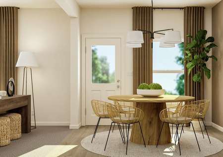 Rendering of the
  cozy breakfast nook featuring a table and chairs.