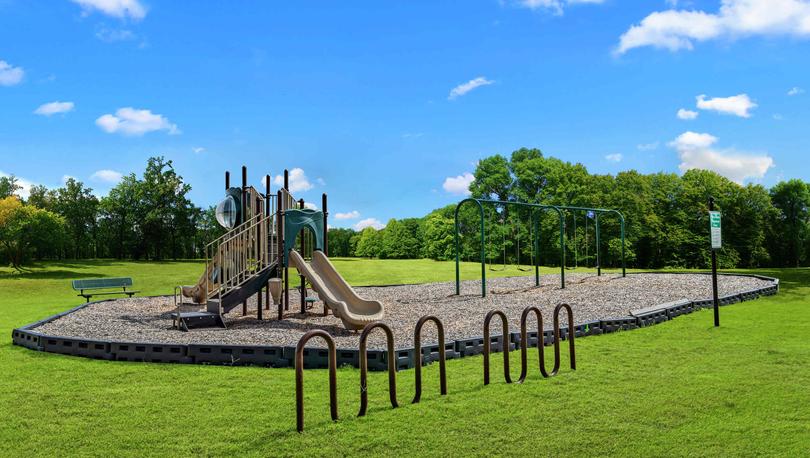 Finlay Farms park with a bike rack next to it.