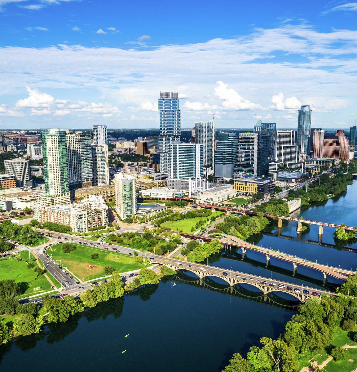 Austin, Texas cityscape taken just before sunset showing a panoramic view of the city