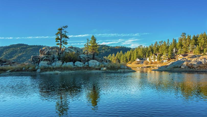 Riverside, California Big Bear Lake at Boulder Bay with large round rocks, pine trees, and lake water