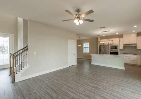 Front entrance, family room and a chef-ready kitchen make up the home's entertainment space.