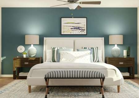 Rendering of spacious master bedroom with
  large white frame bed, matching nightstands, ceiling fan, a blue accent wall,
  décor, and large window on right.