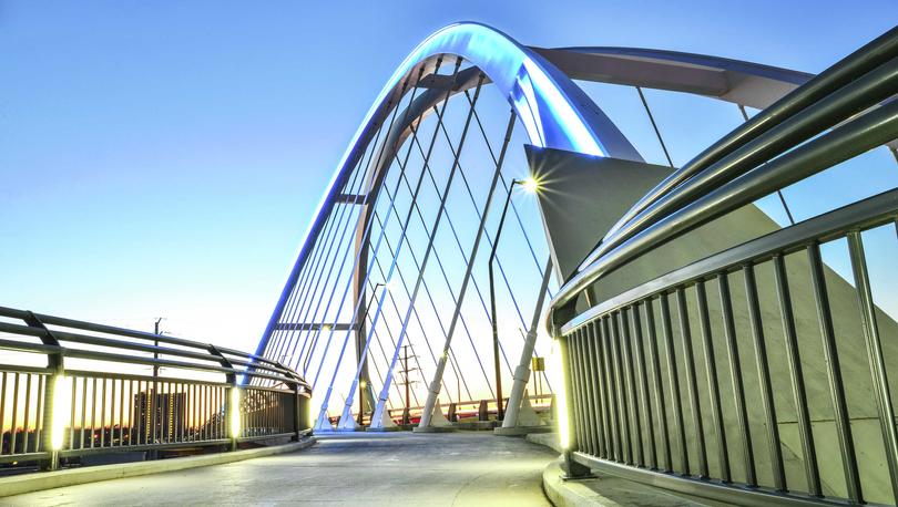 Minneapolis, Minnesota Lowry Bridge connecting the Northeast to North parts of the city with decorative steel archways, walking paths, and metal railings