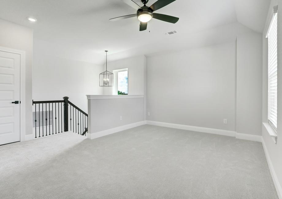 Upstairs loft, perfect for an extra living area or game room.