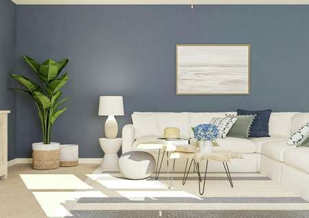 Rendering of the
  living room showing the blue accent wall, white sectional couch, coffee table
  and mounted tv.