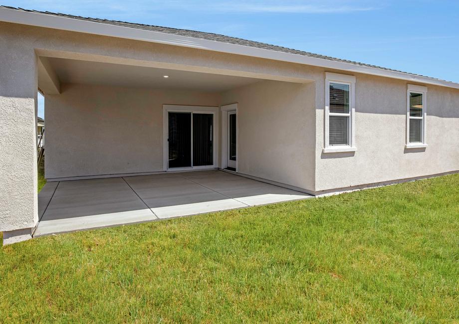 This home has a spectacular covered back patio.