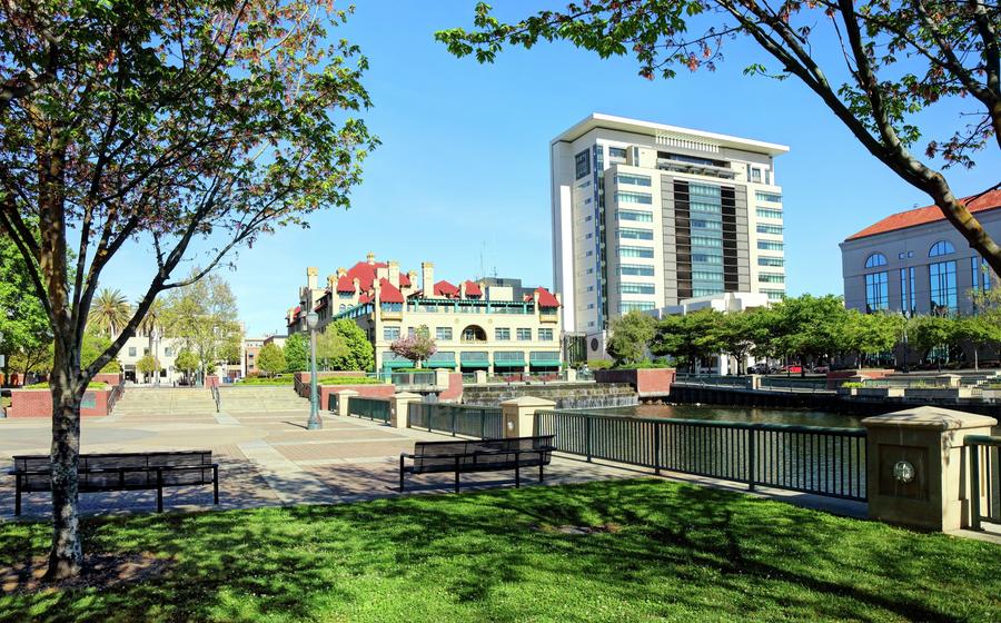 Downtown Stockton, California with buildings and trees.