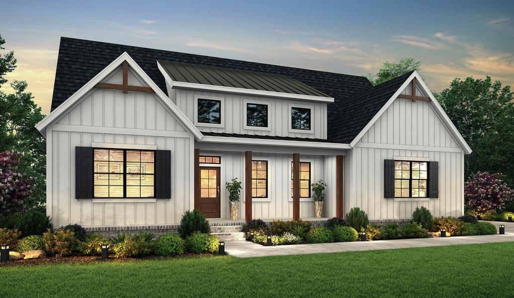 Dusk elevation of the single story Unicoi with white siding, dark shutters and wood accents.