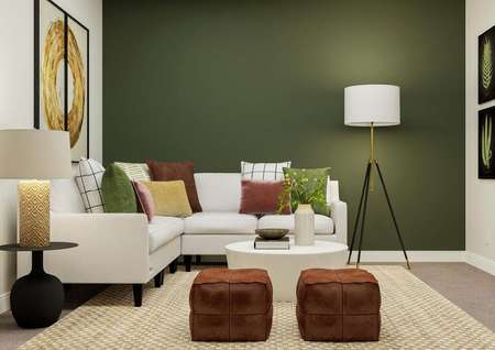 Rendering of the Overholser's media room
  featuring a comfortable furniture along a green accent wall.