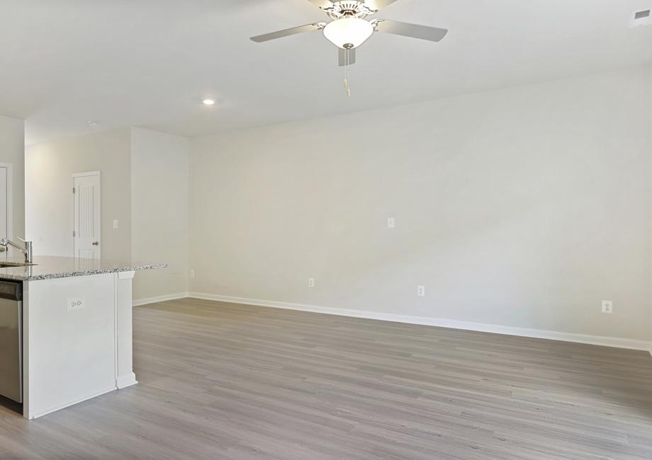 Living room located off the kitchen.