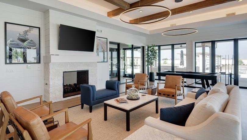 Sitting area at The Ranch House with a television and pool table.