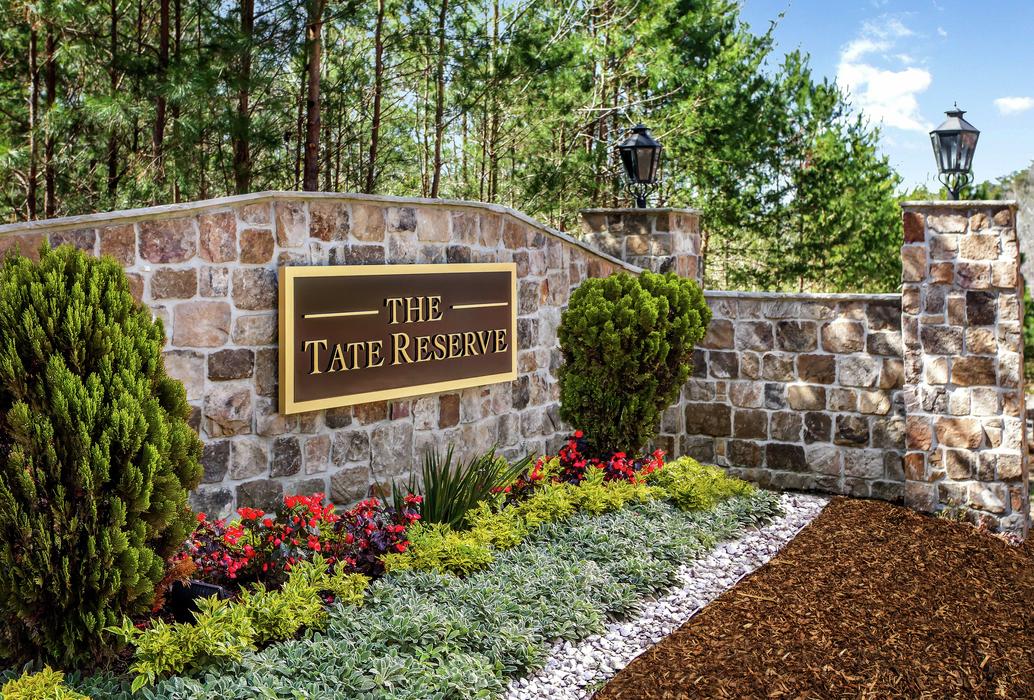 Stone monument with landscaping at The Tate Reserve in Ball Ground, GA.