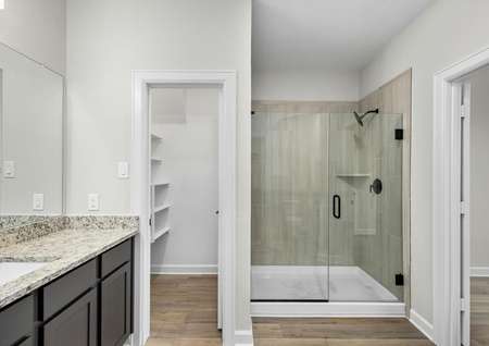 Master bathroom with a step in shower