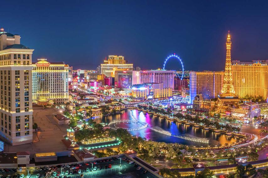 Las Vegas, Nevada strip at night with hotels and casinos, amusements, and roadways below