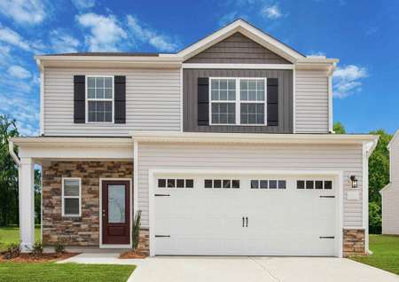 Avery elevation front with white two-car garage doors, window shutters, and green grass