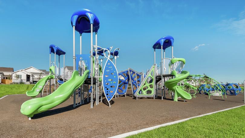 Community playground with slides, jungle gyms, and other fun structures!