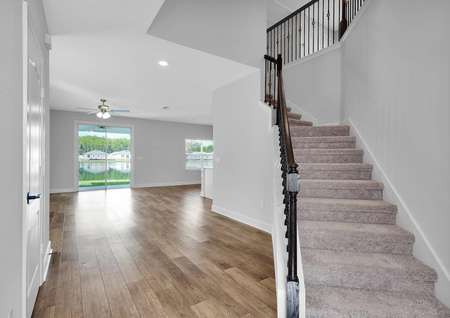Be welcomed into the home with this beautiful entry way with access to upstairs and the family room